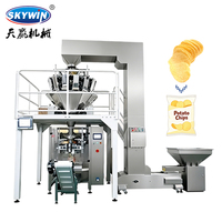 Machine d'emballage verticale électrique entièrement automatique pour l'emballage et le collage de produits alimentaires, de snacks, de chips et de biscuits (film/aluminium haute précision)