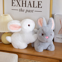 Vente en gros de poupée en peluche de lapin de simulation mignon lapin unisexe réaliste rempli de coton PP cadeau de Pâques pour les filles