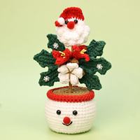 Tendances : Pots de fleurs suspendus en peluche au crochet faits main pour Noël, Pots de fleurs Père Noël, Bouquets de fleurs artificielles modernes pour bureau