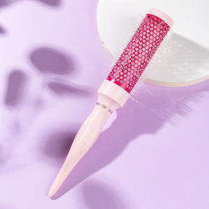 Peine rizador de pelo rosa para mujer, con efecto rizador y voluminizador, portátil, para uso doméstico, para todo tipo de cabello - Product Image 1