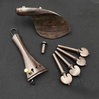 Ensemble d'accessoires pour violon 4/4 en ébène naturel - Comprend un repose-menton, des chevilles, une cordière, une patte arrière et un cordon de queue