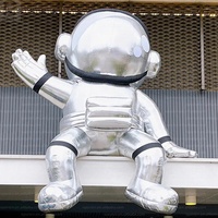 Miroir gonflable géant LED en forme d'astronaute argenté en tissu Oxford avec logo personnalisé pour la décoration d'événements/musée spatial