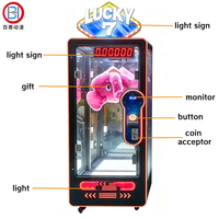 Machine de jeu 'Coupe ton Prix' Lucky 7, modèle 'Factory Cut Prize', blanc rose, en Métal/Acrylique/Verre, personnalisable pour le marché britannique