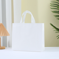 Sacs fourre-tout non tissés stratifiés pressés à chaud Sacs cadeaux publicitaires Sacs en plastique en gros Magasin de vêtements