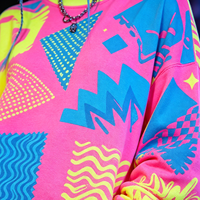 Tenue de rave géométrique réactive aux UV - Ensemble haut épaules dénudées découpé et mini-jupe, Costume de performance pour festivals EDM