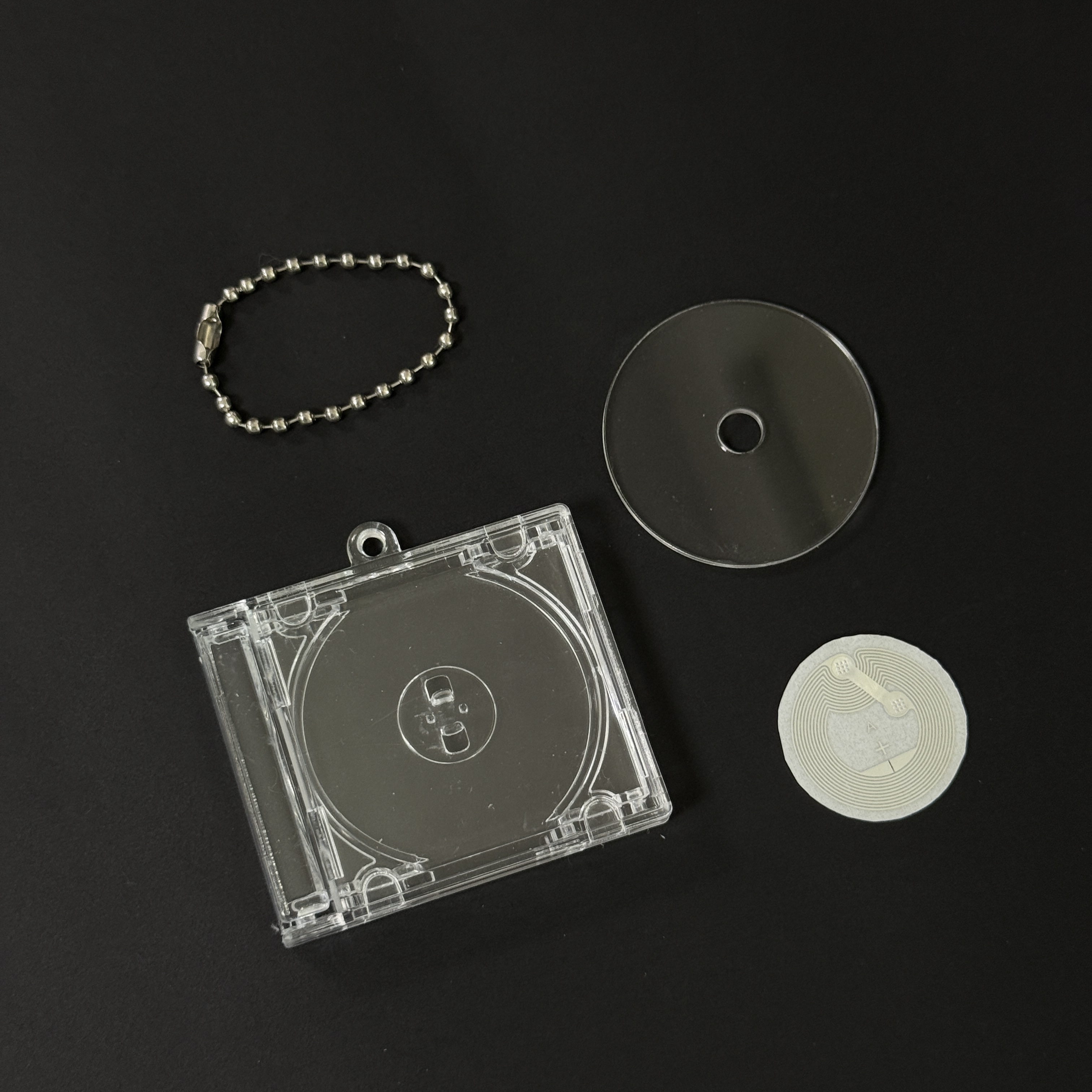 Custodia CD + Catena con Perline + Disco + NFC