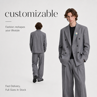 Ensemble de costume blazer croisé oversize pour homme avec pantalon plissé à jambe large, revers pointus, noir et gris, style streetwear formel personnalisé