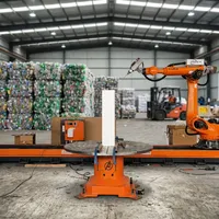 Solusi Lengan Robot KUKA Rel Panjang dengan Meja Putar Opsional