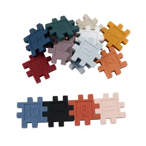 批发双酚a免费硅胶数字拼图出牙玩具，将拼图碎片与硅胶婴儿玩具数学连接