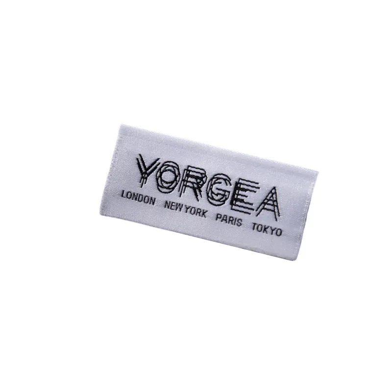 Logo merek logo huruf YORGEA label anyaman lipat ujung cetak kustom label utama ujung dilipat jahit pada label tenun untuk pakaian
