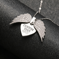 Nouveau collier hip-hop en chaîne de bambou, entièrement incrusté de diamants, avec logo gravé et design d'aile ouvrante en forme d'aileron d'ange