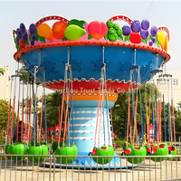 Équipement de parc d'attractions Manèges Carrousel en herbe synthétique Chaise volante à vendre