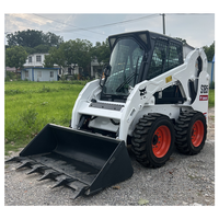 Chargeuse compacte sur pneus Bobcat S185 modèle 2020 avec joystick manuel et équipement multifonctionnel
