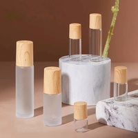 Vente en gros de 1ml couvercle en grain de bois 2ml rouleau en verre transparent dépoli pour bouteille à billes 5ml d'huile 10ml bouteille fendue avec rouleau sur l'étanchéité