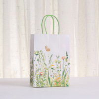 Sacs en papier kraft imprimés flexographiques personnalisés pour l'emballage de cadeaux de café et de bougies, sacs fourre-tout avec logo et poignée, style simple et frais
