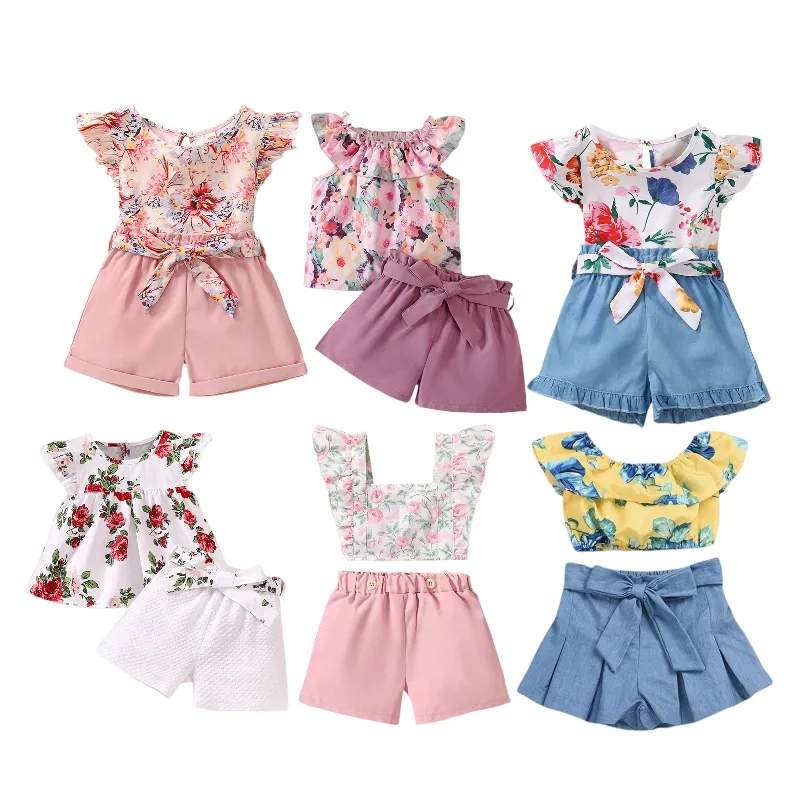 Enfant en bas âge filles mode vêtements d'été 2 pièces ensembles nouveau été fleur T-shirt imprimé nœud jupe 2 pièces bébé tenue