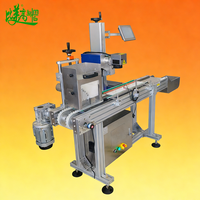 Machine de marquage laser UV à alimentation automatique par roue étoilée pour crayons à yeux avec système de positionnement par vision CCD