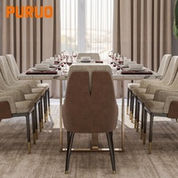 Table à manger ovale Puruo Light Luxury avec plateau asymétrique sur une base de table à manger à 3 pieds en or massif