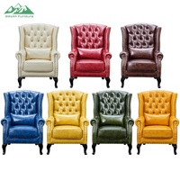 Fauteuil Chesterfield classique personnalisable à une place, capitonné avec boutons et rivets, en similicuir PU rétro, avec pieds en bois assortis