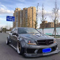 Kit carrosserie pour Mercedes-Benz Classe C W204 C63 AMG, style Robot, comprenant pare-chocs avant, diffuseur arrière et jupes latérales