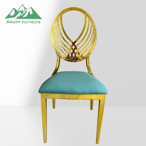 Sedia da banchetto Wayon Luxury in acciaio inossidabile dorato con cuscino blu, schienale geometrico tagliato al laser e gambe in bambù - Product Image 1