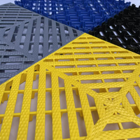 Carreaux de sol modulaires antidérapants 18mm Carreaux de sol de garage en plastique imbriqués pour l'atelier de vente de voitures