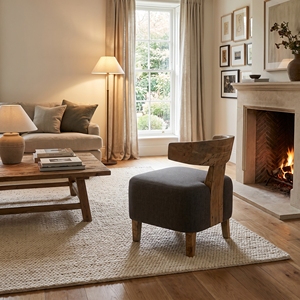The Kate low <b>chair</b> has a sleek, minimalist design with soft cushions and sturdy <b>support</b>, perfect for any modern living room. - Product Image 3