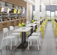 Vente flash, prix bas, ensemble table et chaises de restaurant, cantine, table en plastique durable, chaise en pierre frittée pour utilisation en cantine