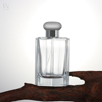 Bouteille de parfum de luxe transparente en verre givré noir de 50ml extrémité ouverte facile boîte de 100ml emballage bouteille de parfum en pierre luxueux