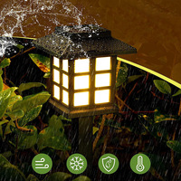 Lumières de pelouse à LED solaires extérieures transfrontalières Lumières de petite maison Pointes de sol solaires Lumières d'ambiance de jardin