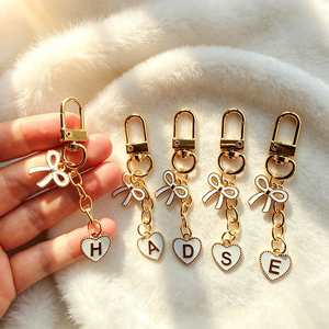 Cute Heart Shape Zinc Alloy Carabiner Keychain With Bow and V Pendant Fashion Trend <b>Key</b> Ring for Bag Decor - Product Image 6
