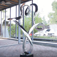 Sculpture abstraite TREVI en acier inoxydable poli miroir, populaire pour les villas modernes, vente en gros pour l'extérieur