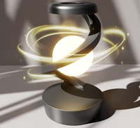 2025 nouveau produit chargeur sans fil flottant capteur de lévitation lumière de table lune lampe à suspension rotative pour chambre