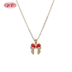 Parure de bijoux romantique en laiton plaqué or 18 carats avec nœud papillon et zircone rouge en forme de cœur, collier et boucles d'oreilles pour femme, idéale pour les soirées - Product Image 5