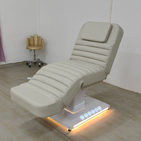 Mesa de masaje de cuero con Base blanca moderna Cama de spa 3 motores Spa eléctrico Cosmético Cama facial con luces LED