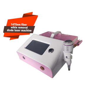 เครื่องเลเซอร์ไดโอด 1470 นาโนเมตร สำหรับฟื้นฟูผิวหน้า พร้อมหัวประคบเย็นแบบค้อน  ลำแสงเล็งเป้าหมาย 650 นาโนเมตร สายไฟเบอร์ยาว 2 เมตร สำหรับการต่อต้านริ้วรอยแบบไม่รุกล้ำ - Product Image 1