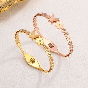 PVD 18K Gold Plated Titanium Stainless Steel Butterfly & Flower <b>Bangle</b> <b>Bracelet</b> with Spring Loaded Clasp for Women - Product Image 2