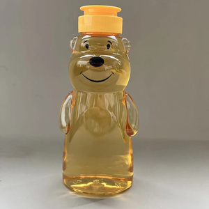 Bouteilles de miel en forme d'ours mignonnes de qualité <span class=keywords><strong>alimentaire</strong></span> 8 oz 16 oz, contenants en <span class=keywords><strong>plastique</strong></span> PET transparent de 250g 500g avec bouchon à clapet jaune - Product Image 2