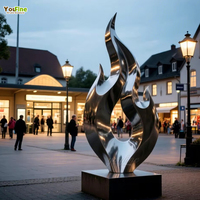 Sculpture de flamme moderne YouFine en acier inoxydable, finition miroir, art métallique pour la décoration de centres commerciaux et de jardins, personnalisable et certifiée