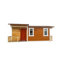 Nouvelle Villa Extérieure Préfabriquée en Conteneur avec Structure en Acier Étanche et Façade Effet Bois pour Jardin Privé