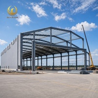 Hangar industriel moderne en structure acier avec toiture et revêtement mural pour entrepôt/atelier – Projet clé en main pour projets aéronautiques