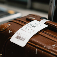 Étiquettes de bagages et étiquettes de valises personnalisées en PP thermique imperméable autocollantes avec options de couleurs personnalisées
