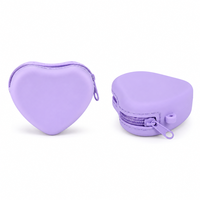 Pochette de rangement portable en silicone en forme de cœur, avec fermeture éclair, pour câbles, cosmétiques et articles essentiels quotidiens