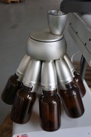 Pemisah Rotary Laboratorium Elektrik Terkontrol PLC Akurasi Tinggi Ukuran Pengisian 10mm 8/6 Botol Pengambilan Sampel Pengaturan Waktu 1-99 menit