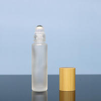 Flacon roll-on d'huile essentielle en verre transparent de 10 ml, marque Lvhuan, Zhejiang, avec bouchon en bambou et impression sérigraphiée, le choix privilégié des grossistes en cosmétiques