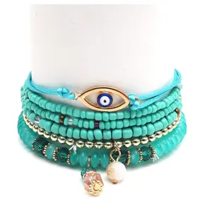 Factory Designer Boho Multi Layer Rice Beaded Evil Eye Bracelet Gold Plated For Woman Supplier Customize Bracelet For Hand