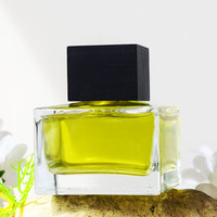 Bouteilles en verre de parfum carrées en cube de luxe de 50ml 100ml Bouchons carrés en bois à bille de couleur transparente personnalisée pour diffuseur d'emballage