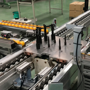 Precision Double Speed Chain Conveyor with Rotary Transfer Mechanism for Multi-Directional Product Flow and Orientation Control - Product Image 1