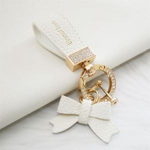 Wholesale New Fashion Butterfly Festival Car <b>Keychain</b> <b>Personality</b> Rhinestone Leather <b>Keychain</b> Cute Couple <b>Keychain</b> Gift - Product Image 6