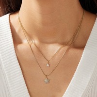 Collier double couche chic avec pendentif cœur et étoile en zircon pavé étincelant, chaîne irrégulière, bijoux haut de gamme pour femmes en gros TGXL14809